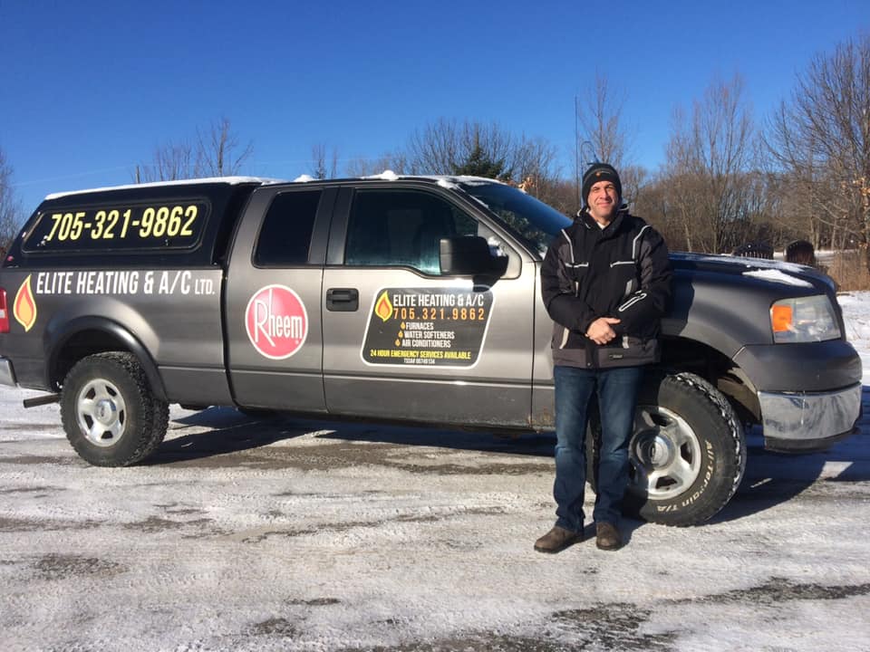 Contractor standing in front of EHAC truck.